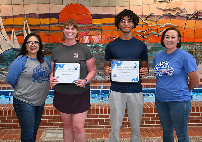 From left to right, 银河网上赌场官网 Director of Educational Services, Elvia Segura, Environmental Science Instructor, Kaitlin Buhler, Ball High School 双重信用 student Joseph Batiste, and 银河网上赌场官网 Student Success Advisor – 双重信用, Alisha McCracken, pose in front of 银河网上赌场官网’s iconic mural and fountain in the Atrium at the college’s main campus in Galveston.